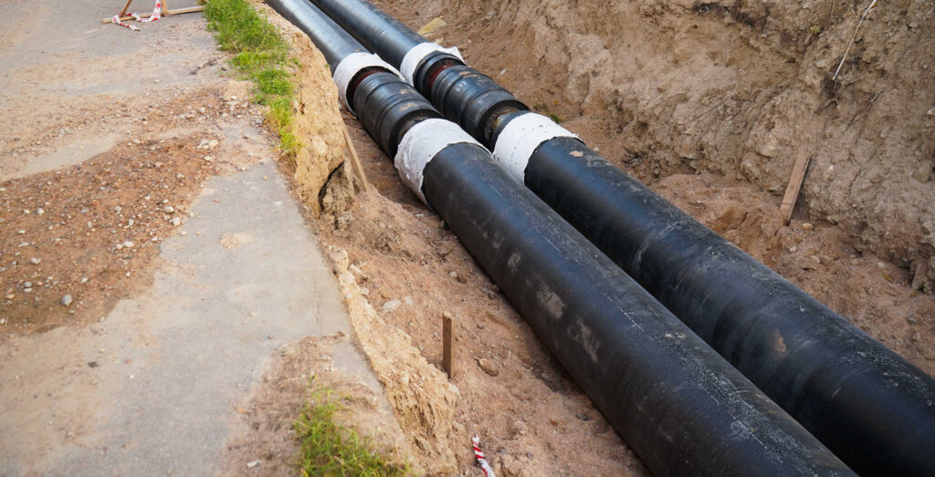 Sewer line pipes getting installed underground.