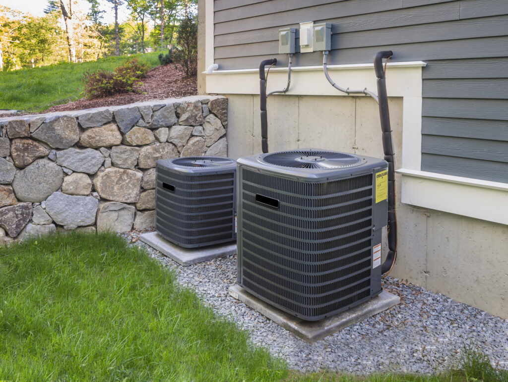 Residential HVAC outside of suburban house.