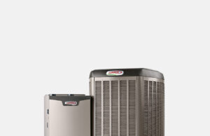 Close up of Lennox AC unit and Lennox furnace.